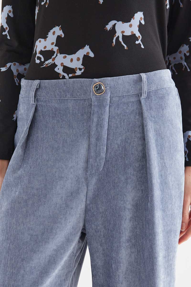 Light blue velvet trousers with jewel button
