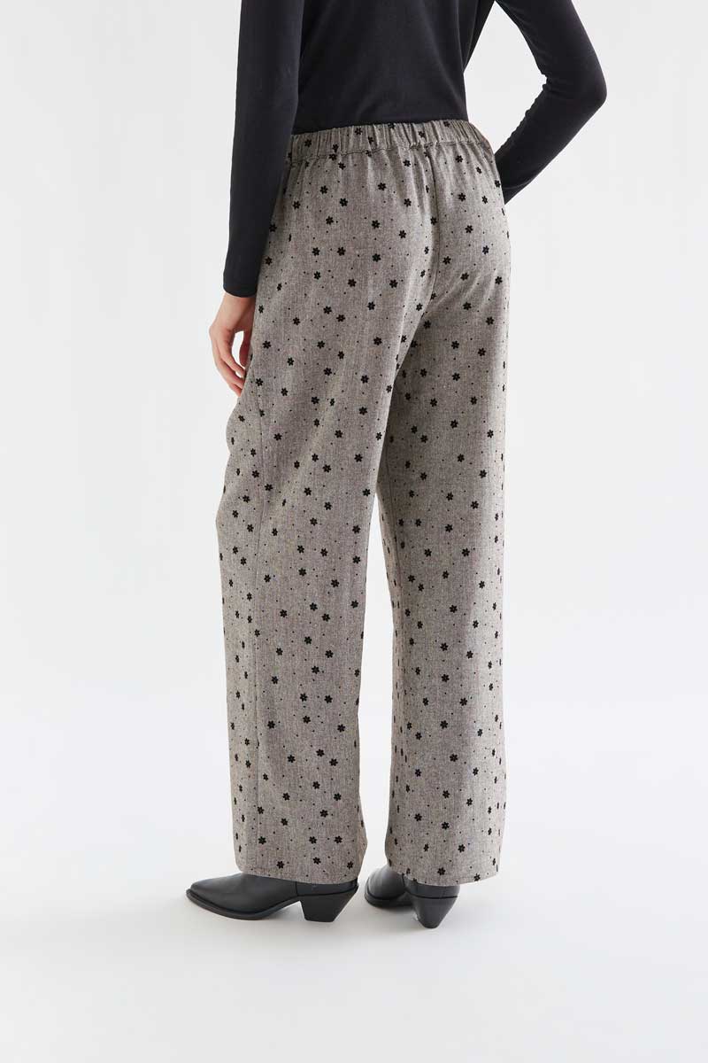 Gray tweed trousers with black embroidered flowers